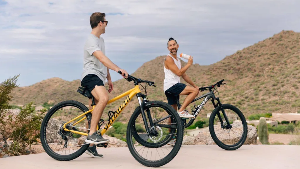 couple on bikes at ADERO romantic resort in arizona